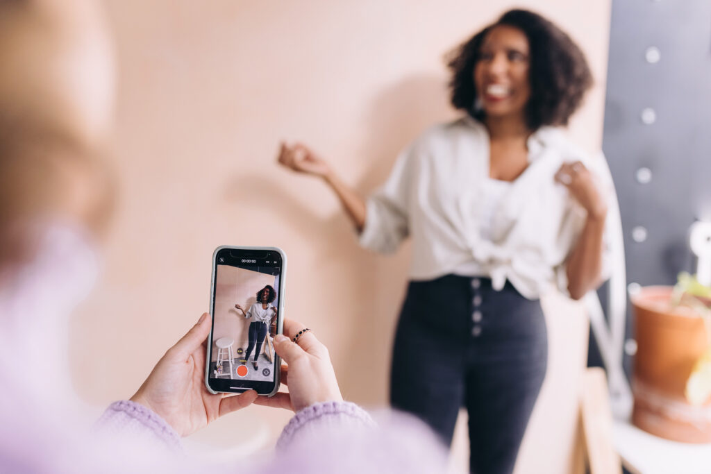 woman recording a video for social media